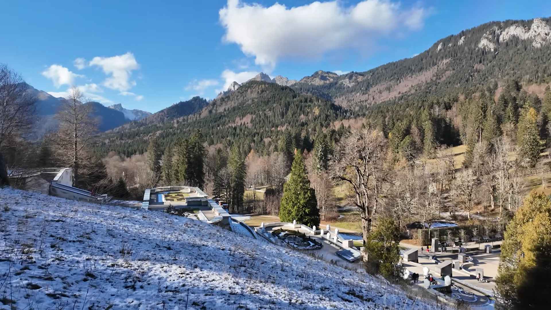 Scenic mountain landscape in the Bavarian Alps with light snow and clear blue skies