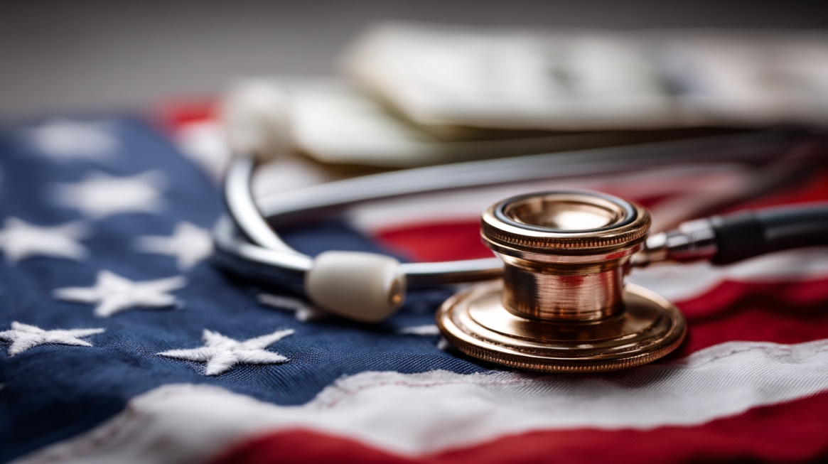 Stethoscope resting on an American flag representing healthcare expenses and monthly living costs in the United States
